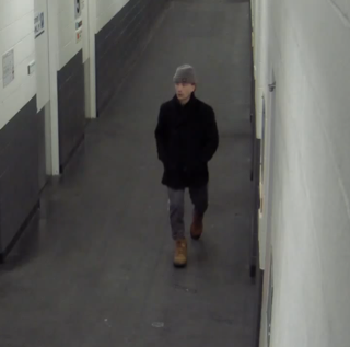 Person walking down a hallway