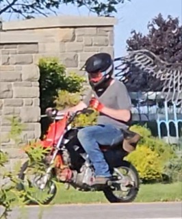 Person on a mini dirt bike