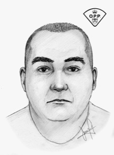 Portrait of a man with a short haircut and a serious expression.