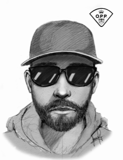 Portrait of a man wearing a hat and sunglasses.