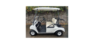 White golf cart with open doors and roof.