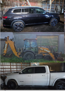 Black SUV parked on gravel. Yellow construction equipment. White pickup truck.