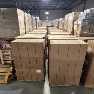 Stacks of cardboard boxes on pallets.