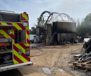 Fire truck and damaged building