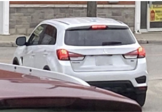 White SUV rear view