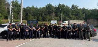 Group of police officers in uniform.