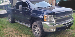 Blue Chevrolet 3500 HD pickup truck
